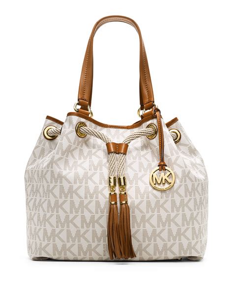 michael kors tan purse with tassels|Michael Kors beige purse.